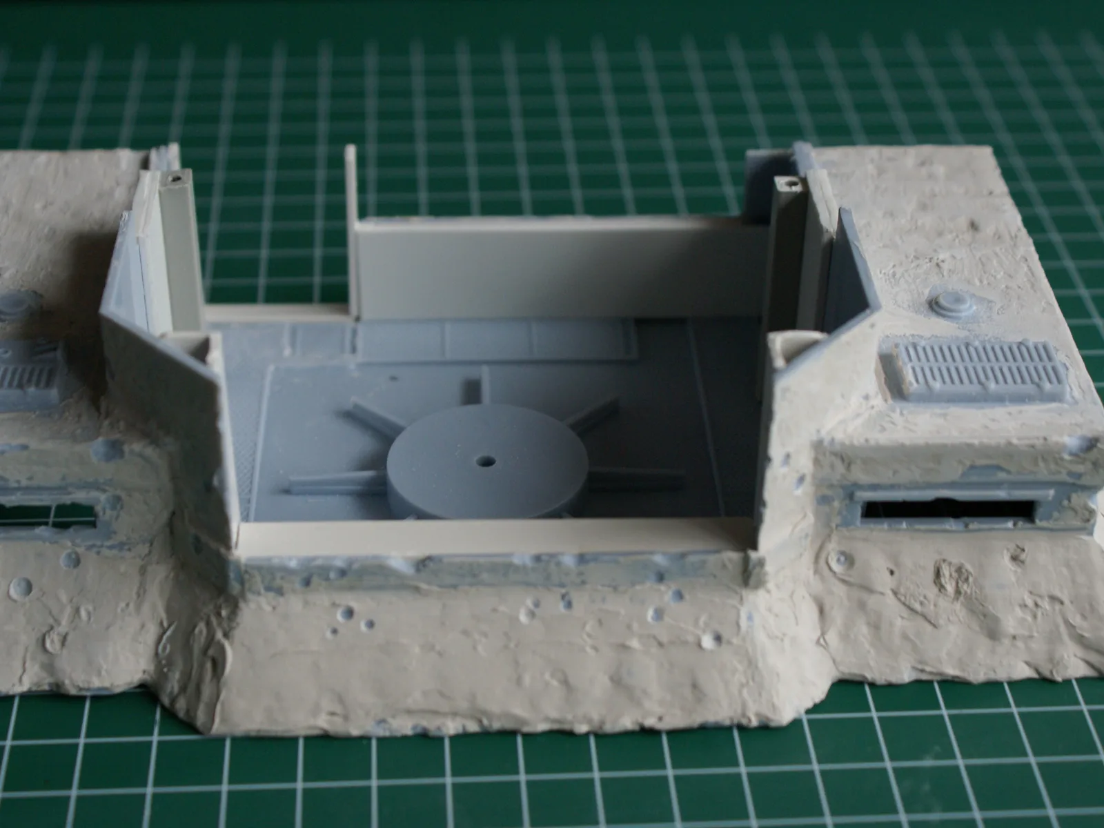 The open gun pit in the middle of the fort before the turret goes in