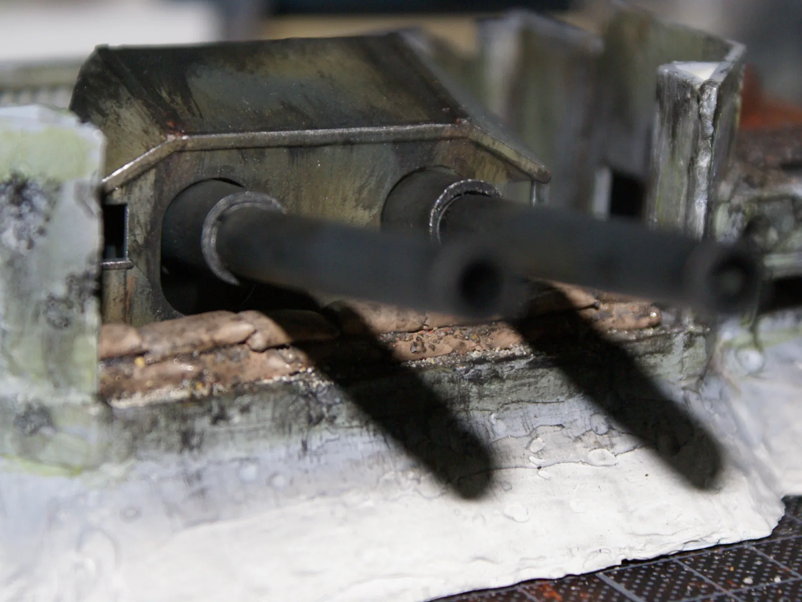 The twin barrels of the main gun sticking out of the turret