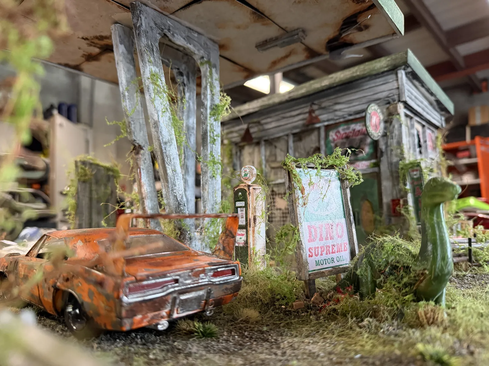 The rusted orange Charger Daytona parked at the gas station