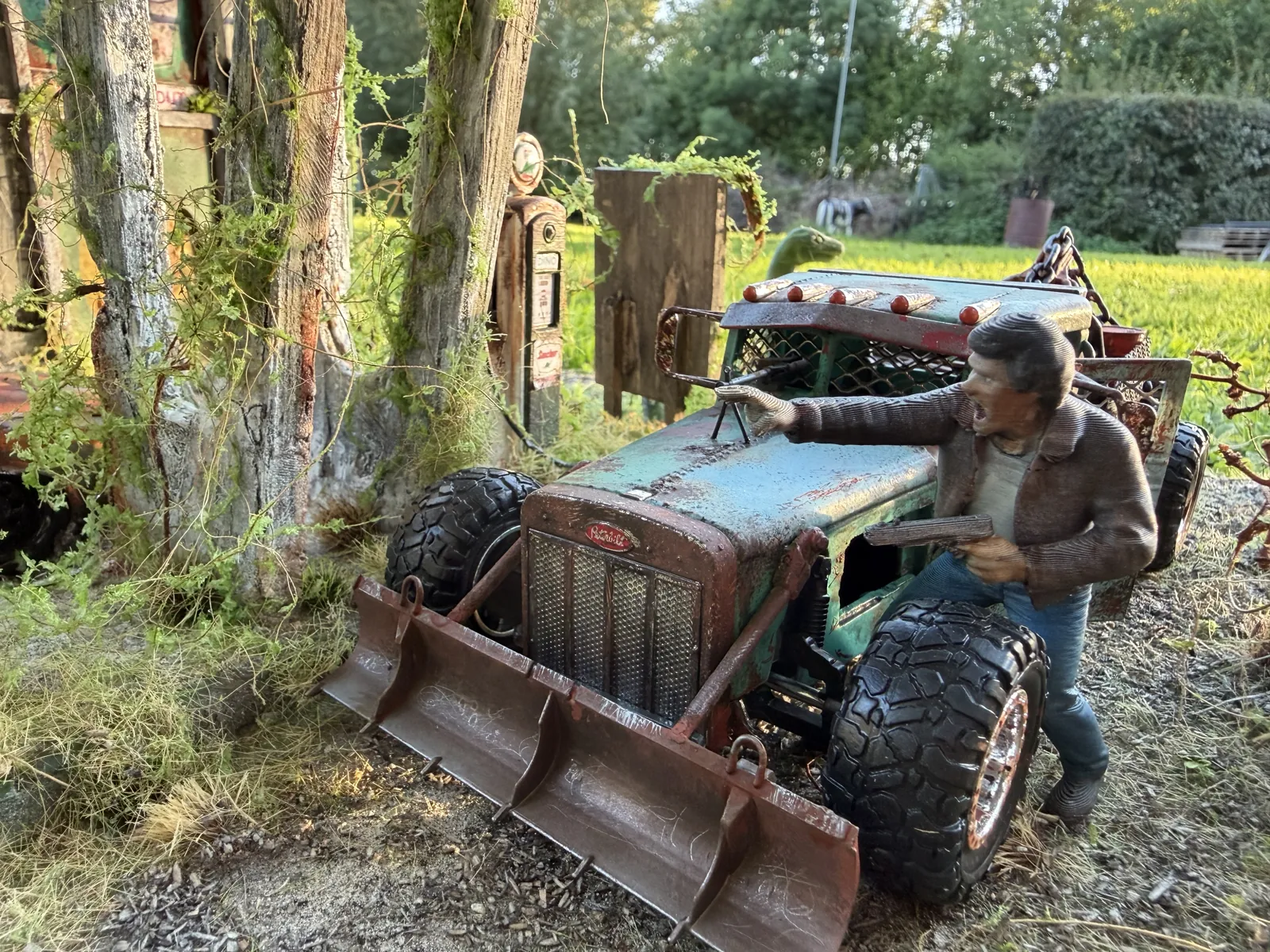 The custom Peterbilt tow truck with a gunman at the 1:24 abandoned gas station